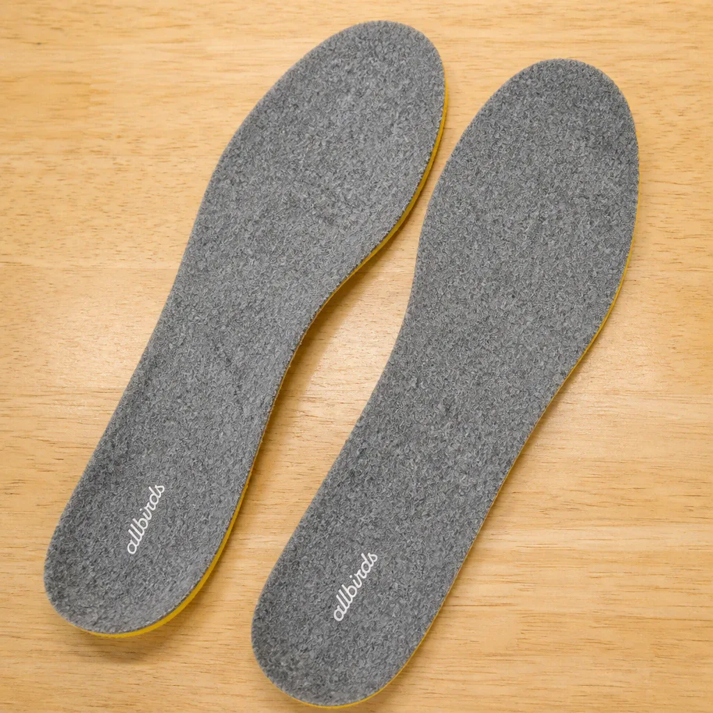Allbirds Featherbed insoles side by side on a kitchen table