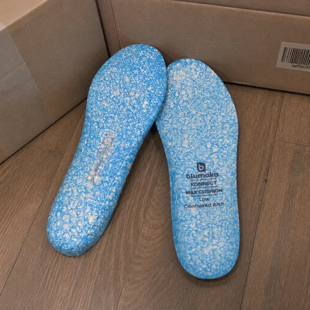 Blumaka NonSlip Performance Insoles laid out beside their retail boxes