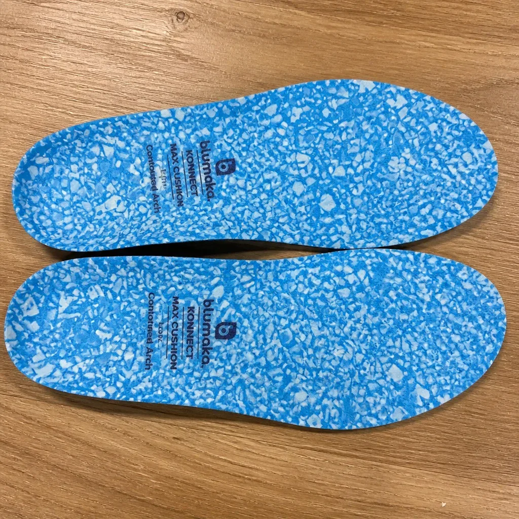 Blumaka NonSlip Performance Insoles on a kitchen table next to the shoes used during testing