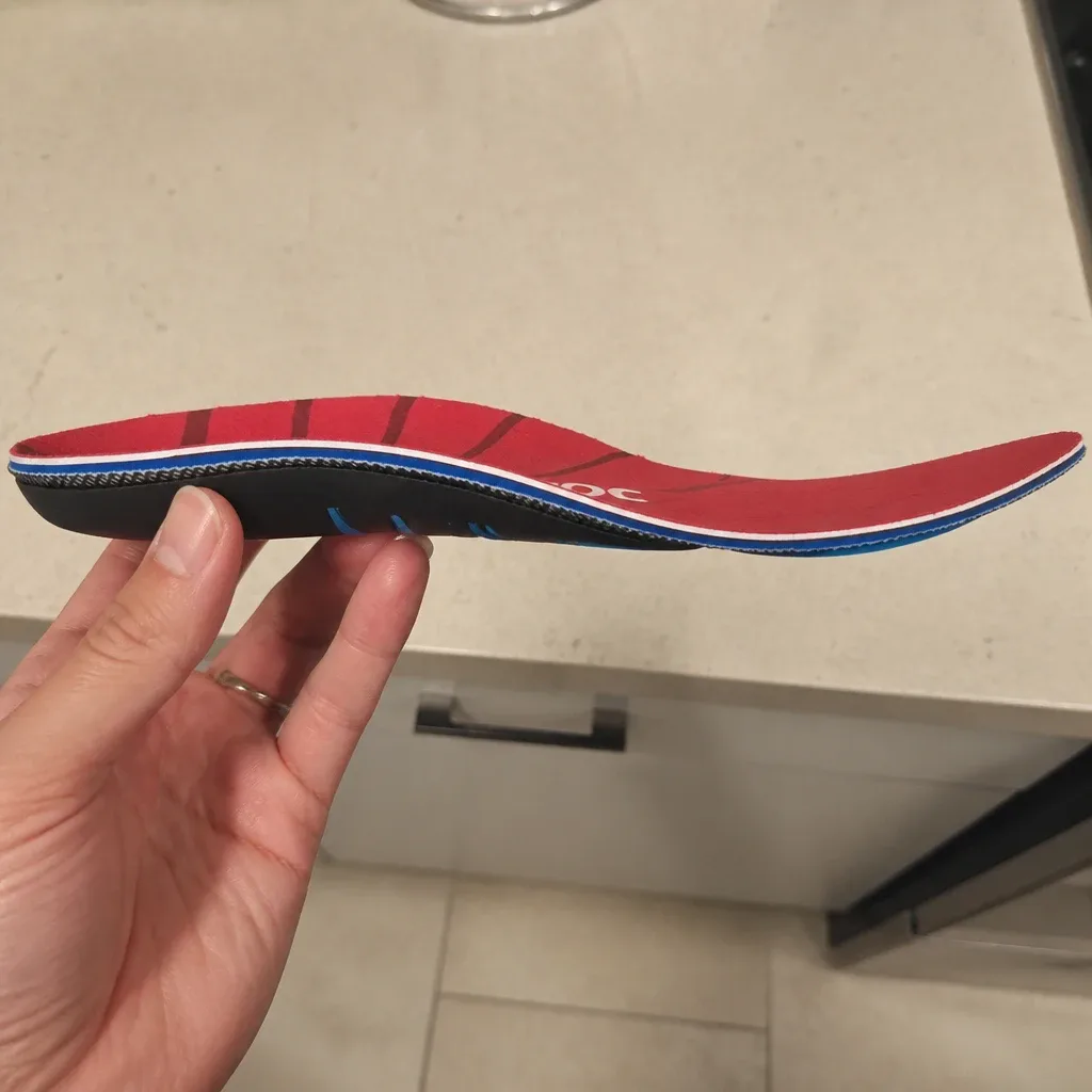 Boot Doc Comfort Insole shown from the side to check shell rigidity