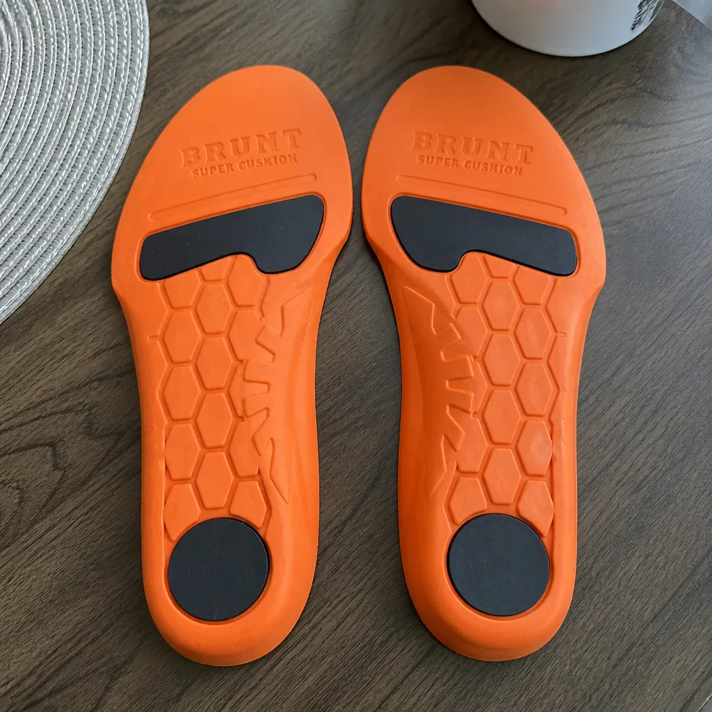 BRUNT Super CUSH'N Insoles drying on the kitchen table after a hand-wash