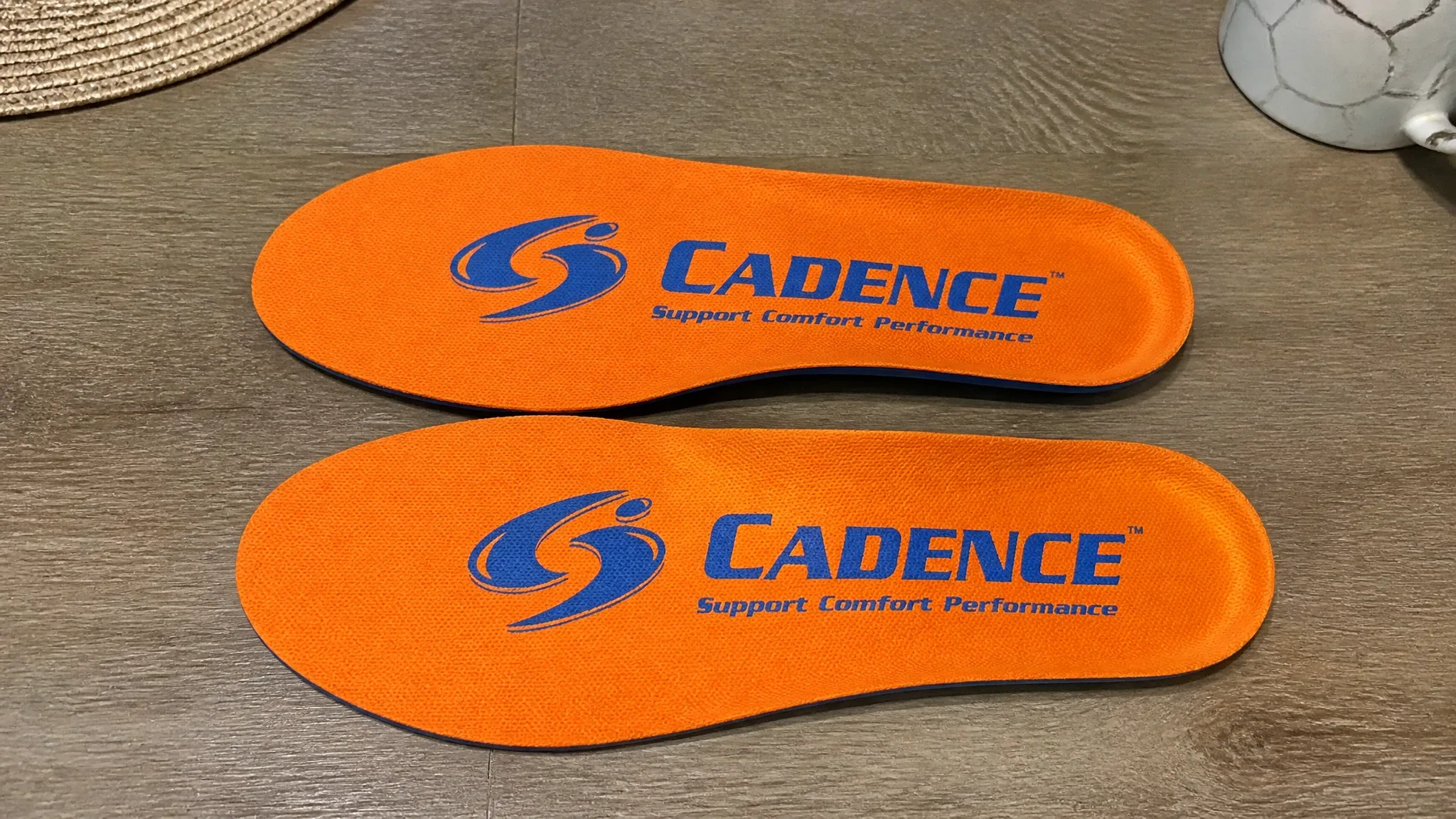 Cadence Original Orange Insoles laid out for testing