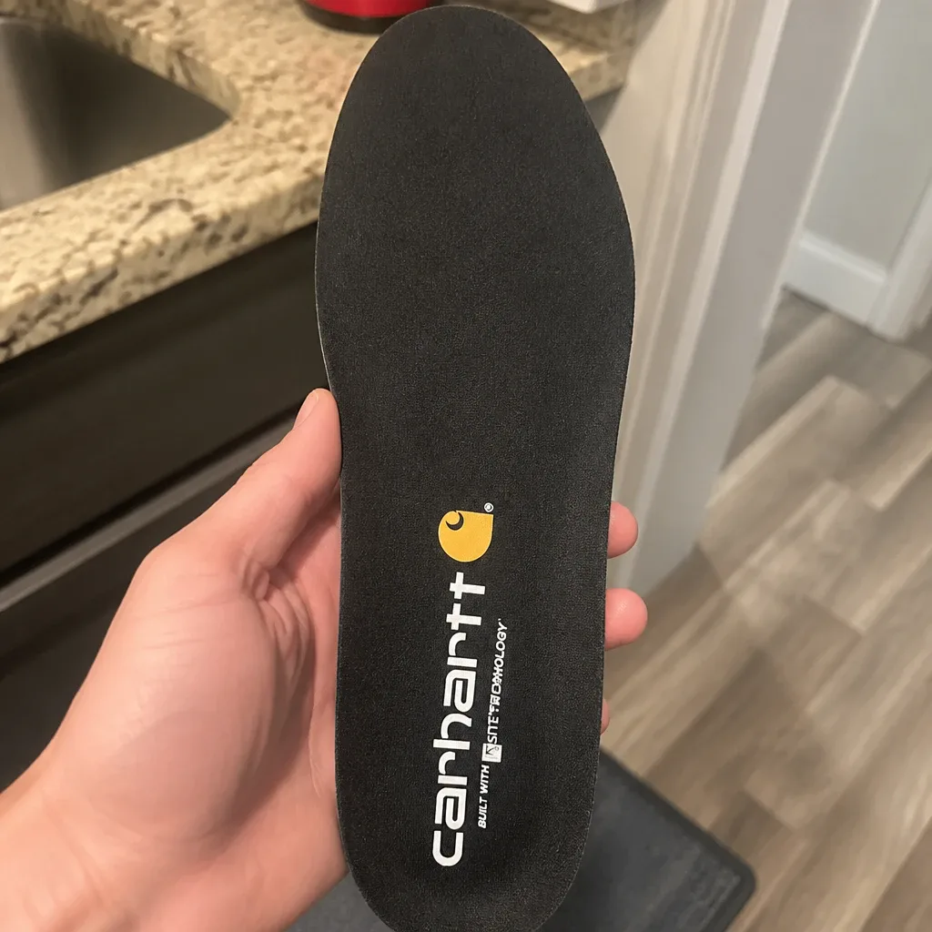Carhartt Insite Insole held in hand to check heel cup depth