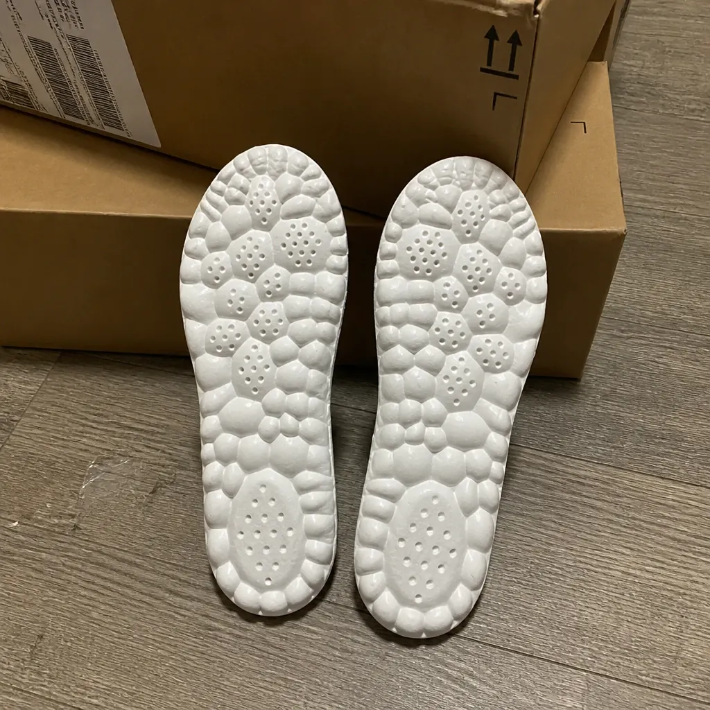 CloudSole Insoles boxes on the floor after unboxing