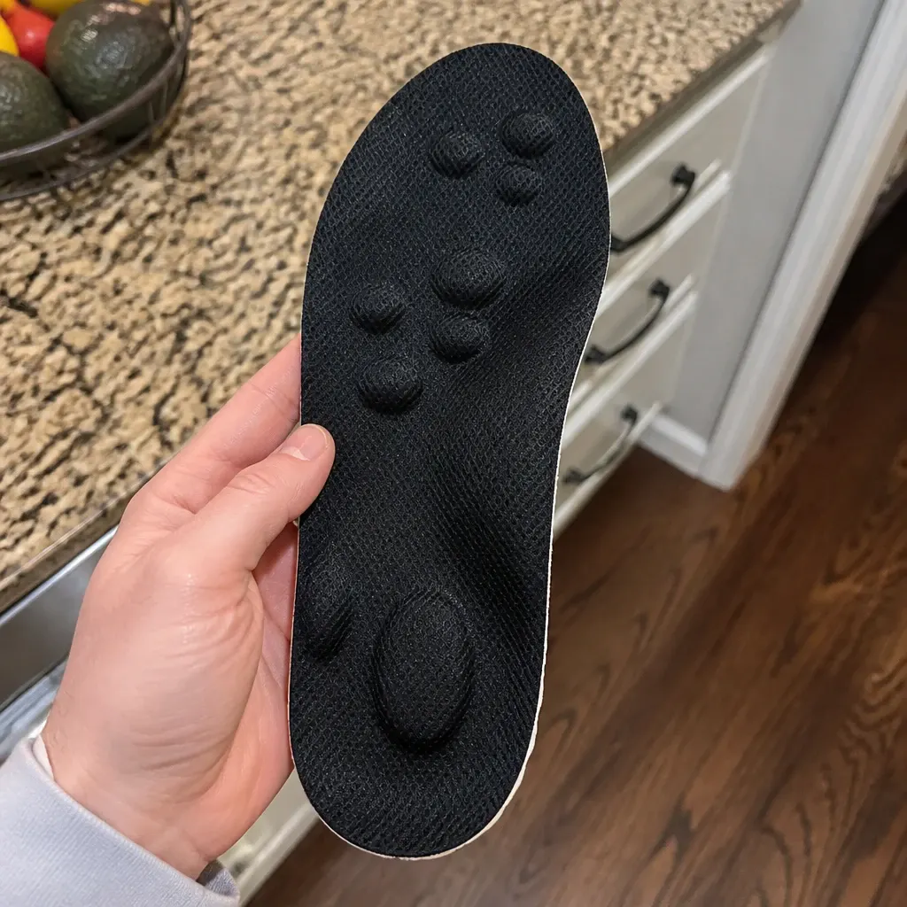 CloudSole Insoles held in hand during testing