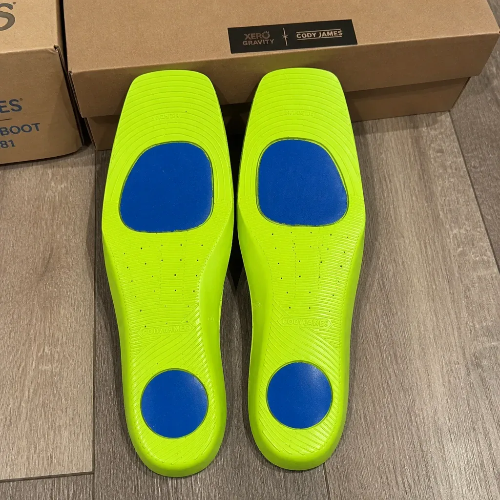Cody James Xero Gravity Comfort Insoles unboxed next to their retail packaging