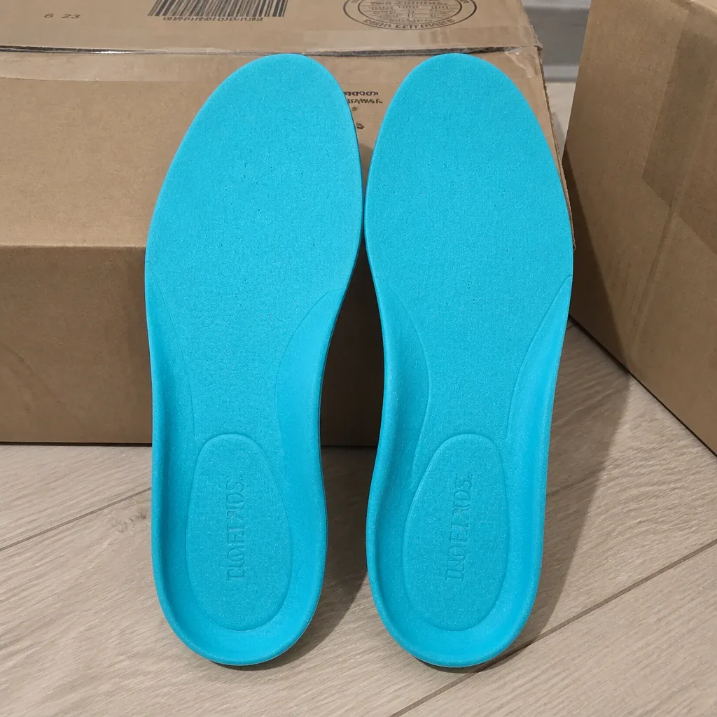 Comfort Fit Orthotics insole boxes unboxed on the floor
