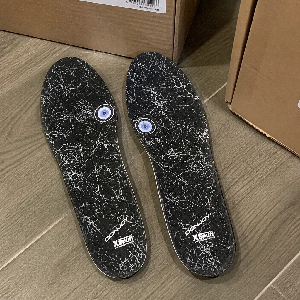 DonJoy insole box straight out of packaging on the floor before fitting
