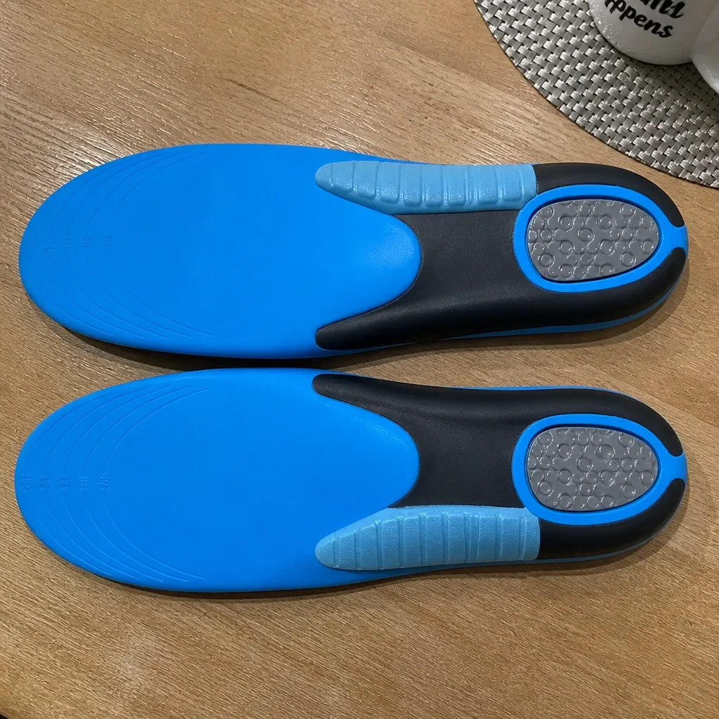 Dr Plantar insoles airing out on a kitchen table