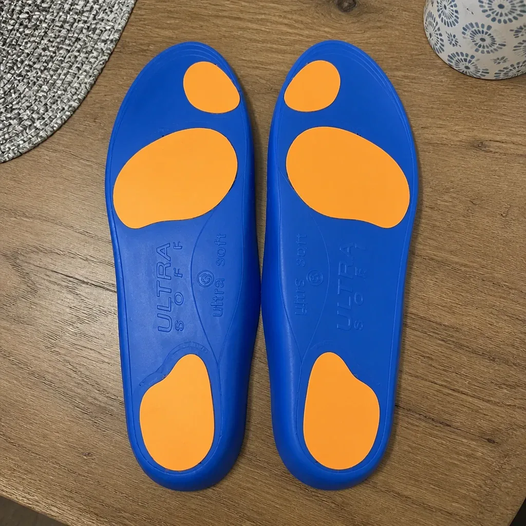 A second view of the Ergonx Ultra Soft insoles laid flat on a kitchen table