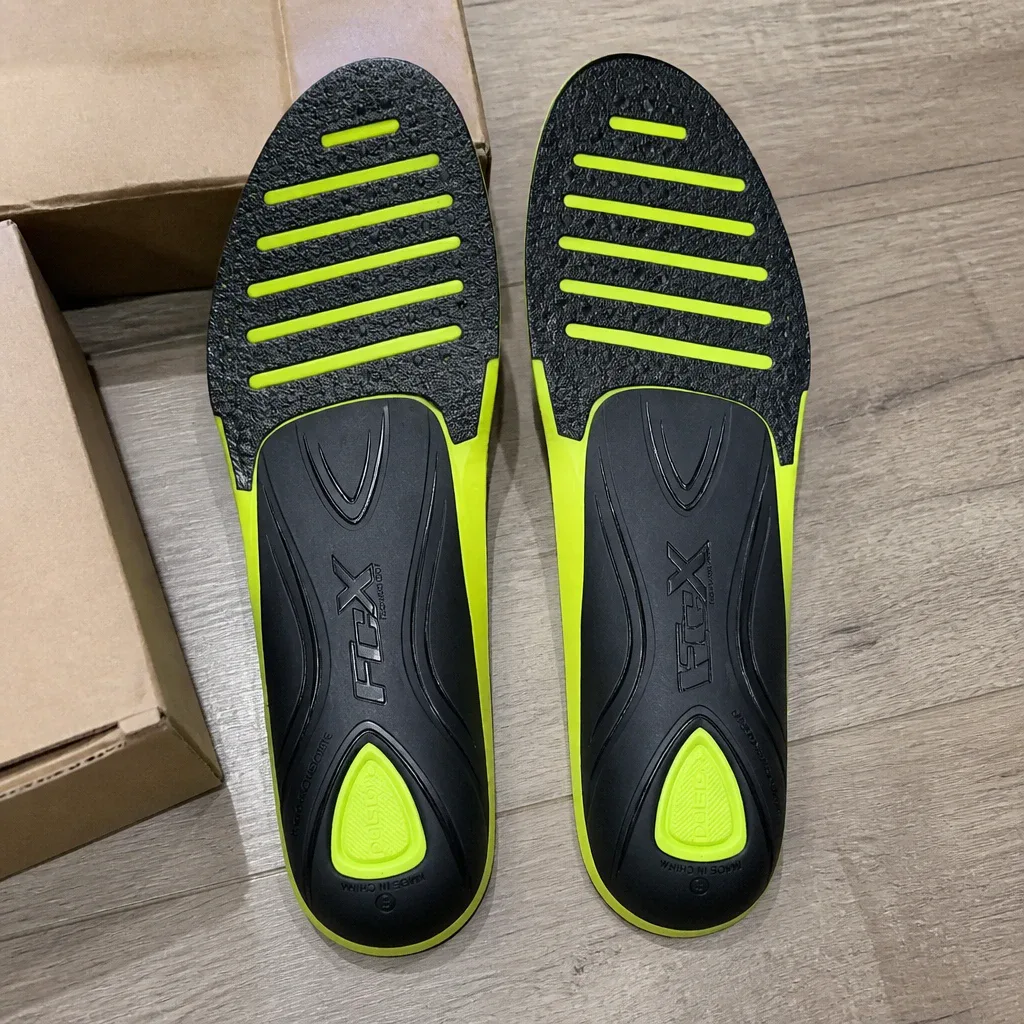 FCX Global Insite Fusion Elite insoles laid out beside their retail boxes on the floor