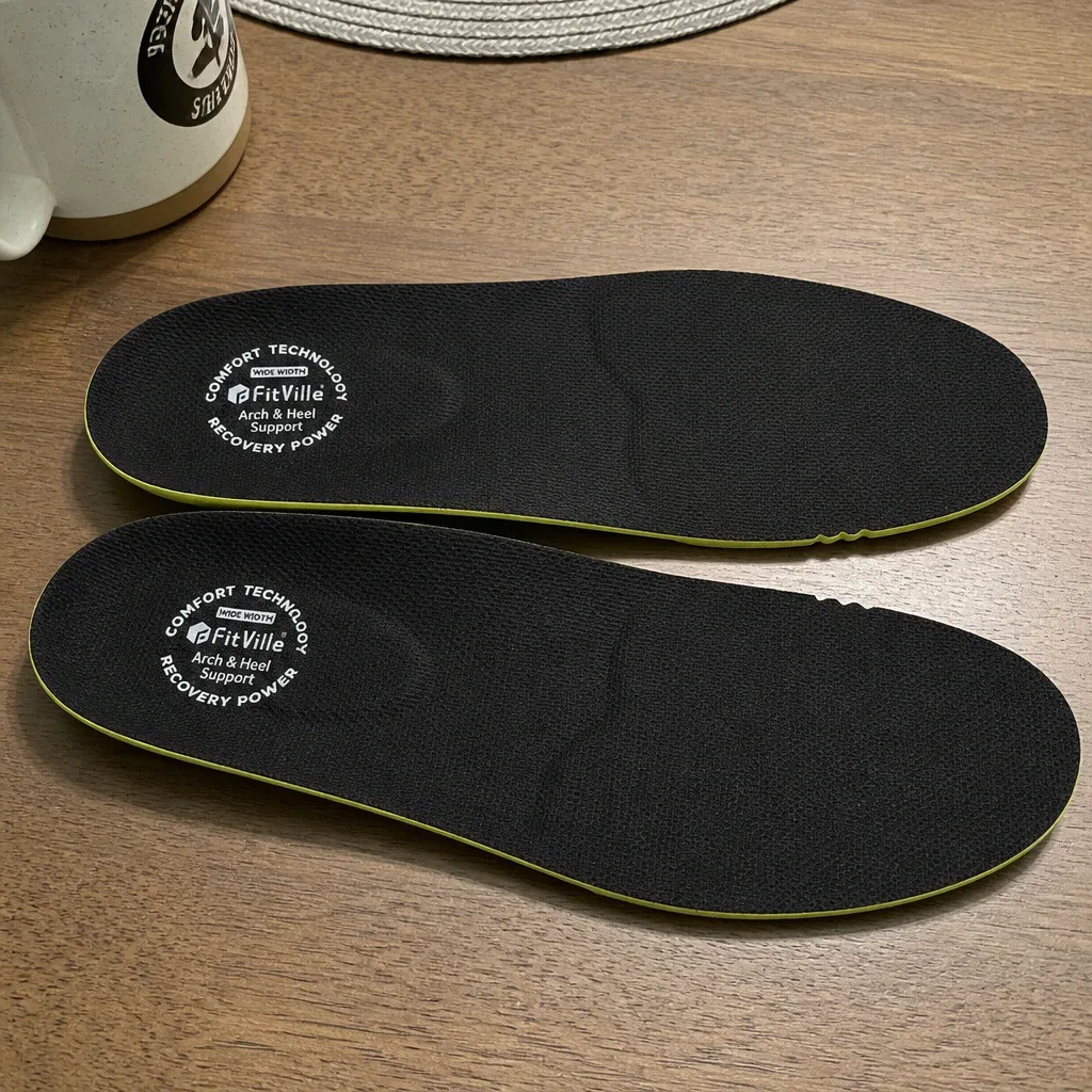 A pair of Fitville Comfort insoles laid out on a kitchen table