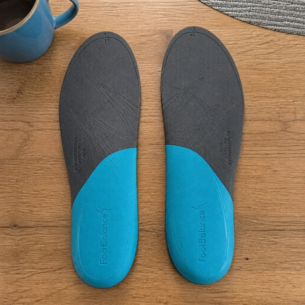FootBalance QuickFit Balance insoles side by side on a kitchen table after testing