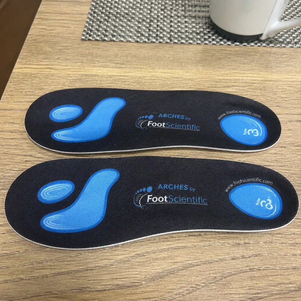 FootScientific Arches Type 3 orthotics on a kitchen table, unboxed