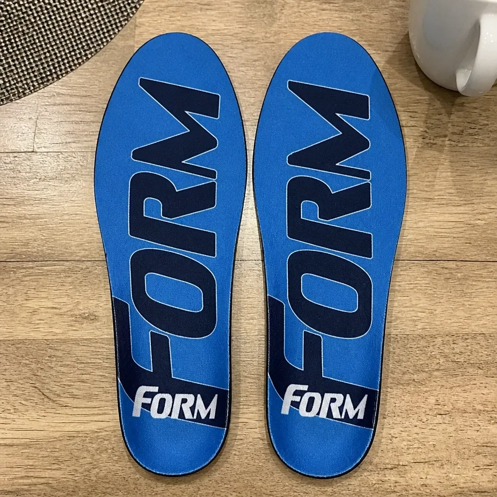 FORM Maximum Support insoles laid out on a kitchen table