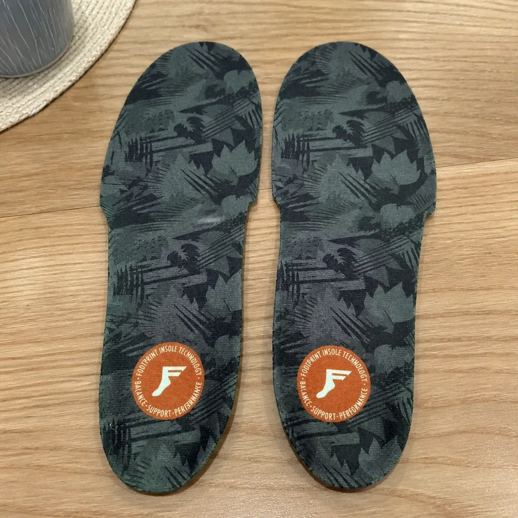 FP Gamechangers Elite insoles laid out on a kitchen table