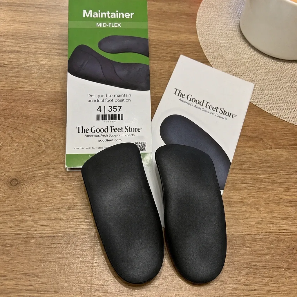 Good Feet Store Maintainer insoles laid out on a kitchen table