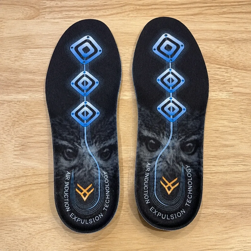 Pair of HAWX Ground Support insoles on a kitchen table