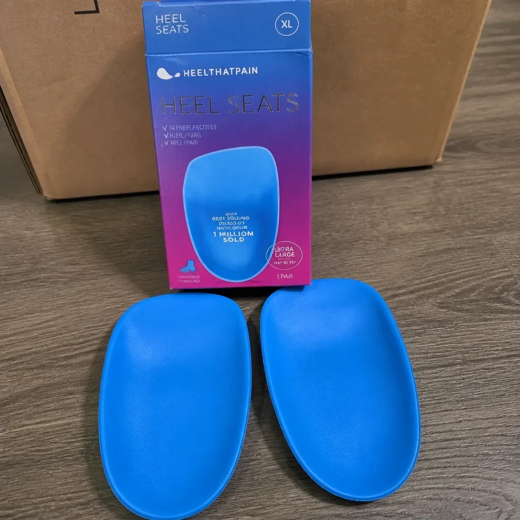Heel That Pain Heel Seats with their boxes on the floor