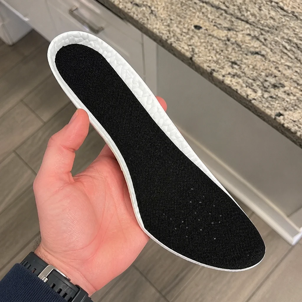 Hefe Luxx Ultra Deluxe 2.0 insole held in hand to show the arch