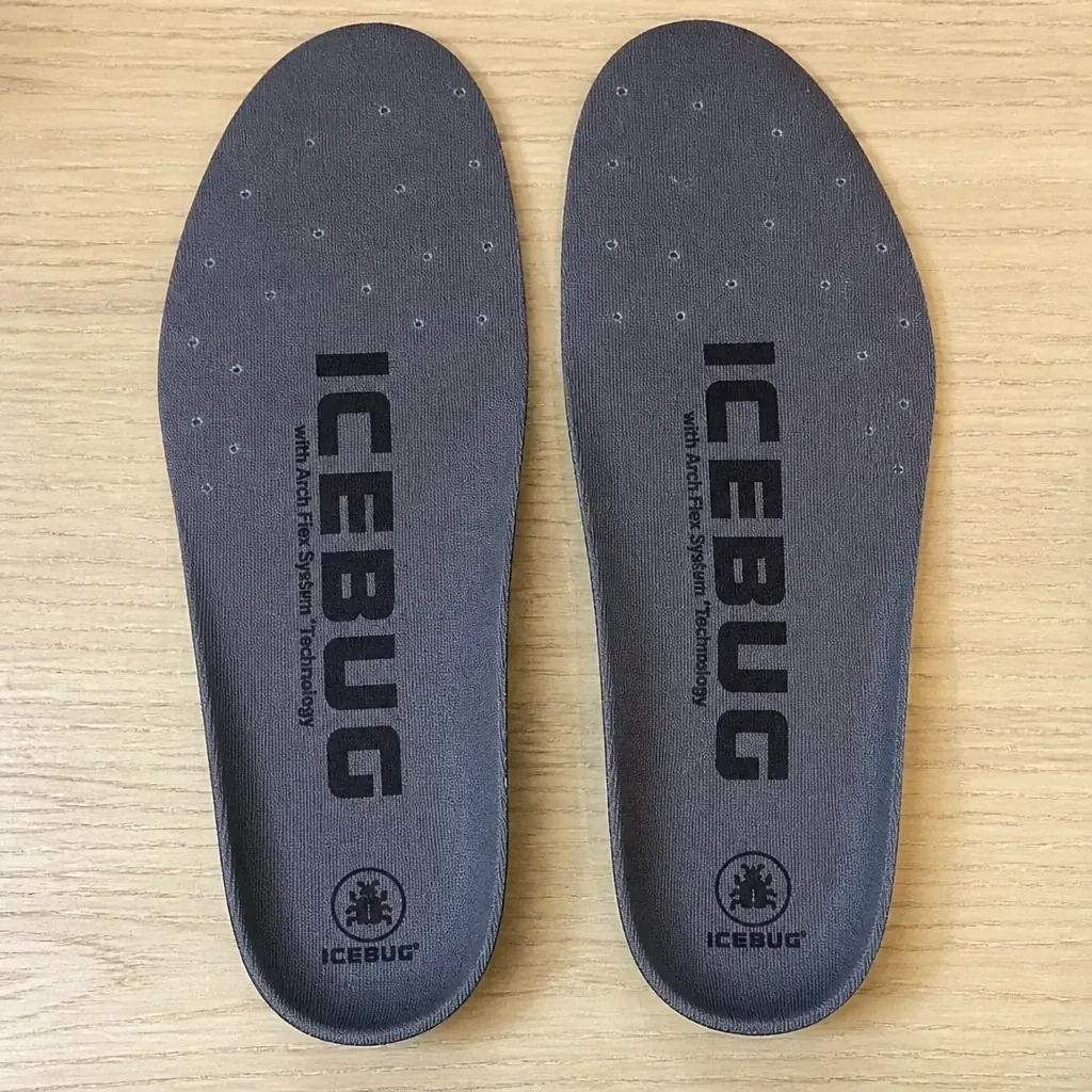 Icebug Comfort insoles side by side on a kitchen table