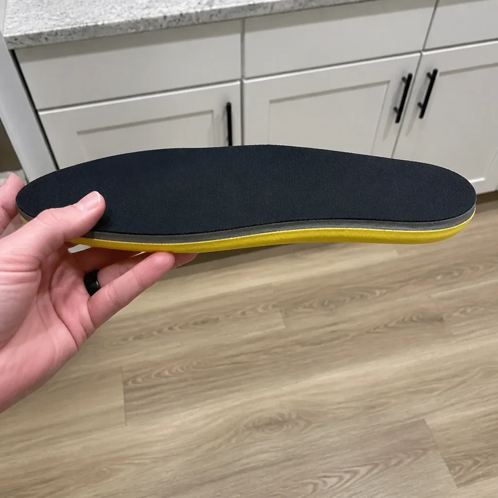 Impact Gel Generation 3 SUPERS insole held sideways to show its thickness