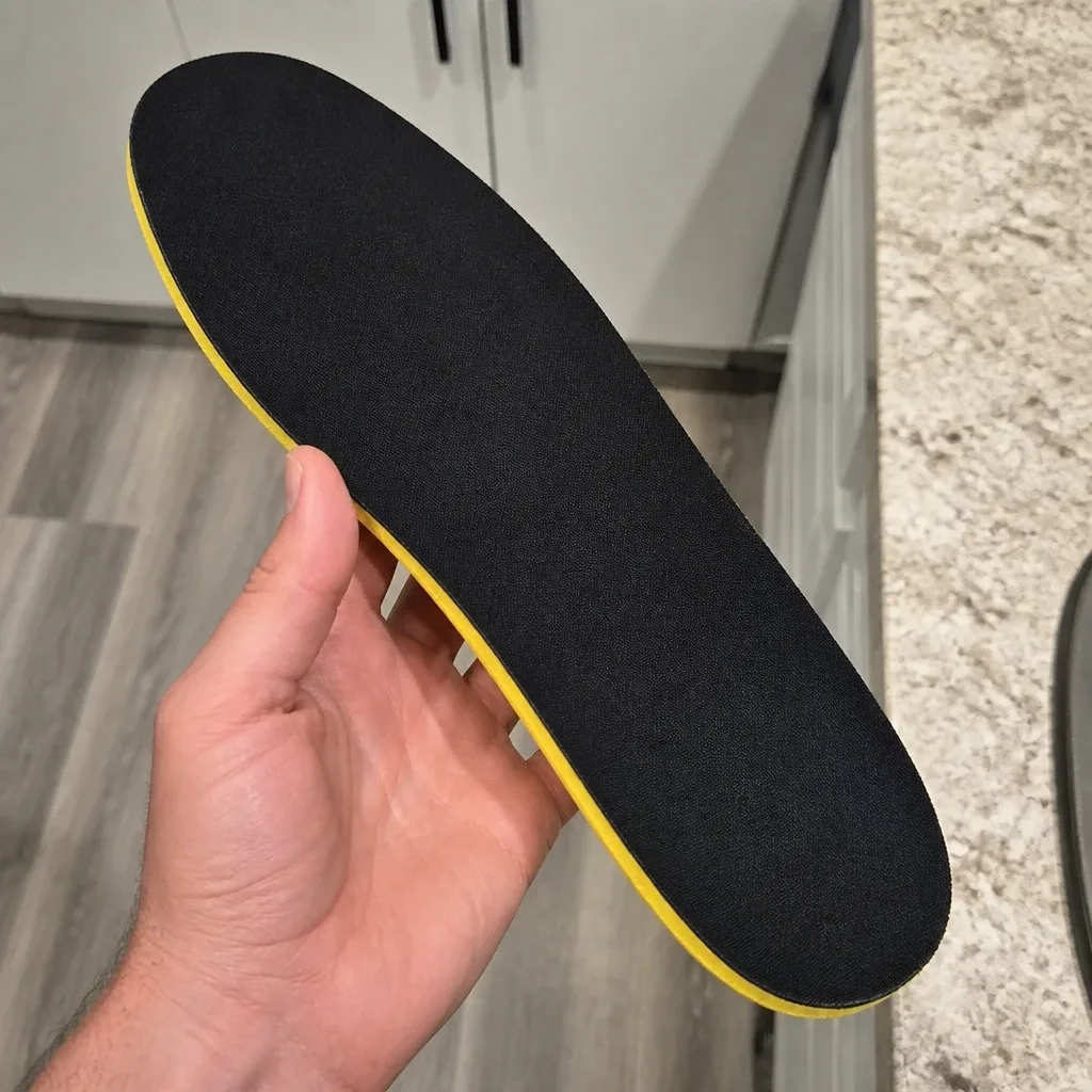 Impact Gel Generation 3 SUPERS insole held in hand showing the gel top layer