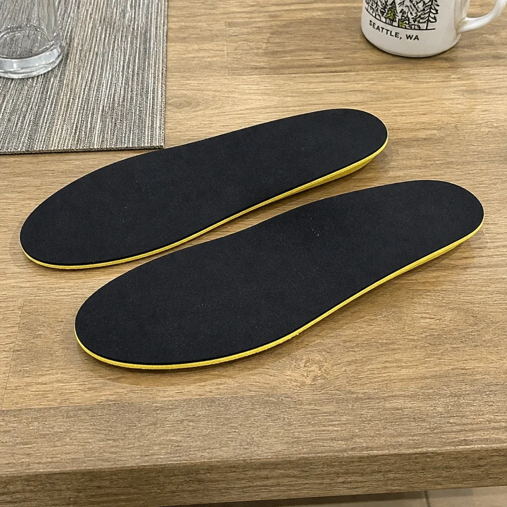 Impact Gel Generation 3 SUPERS insoles laid out on a kitchen table before trimming