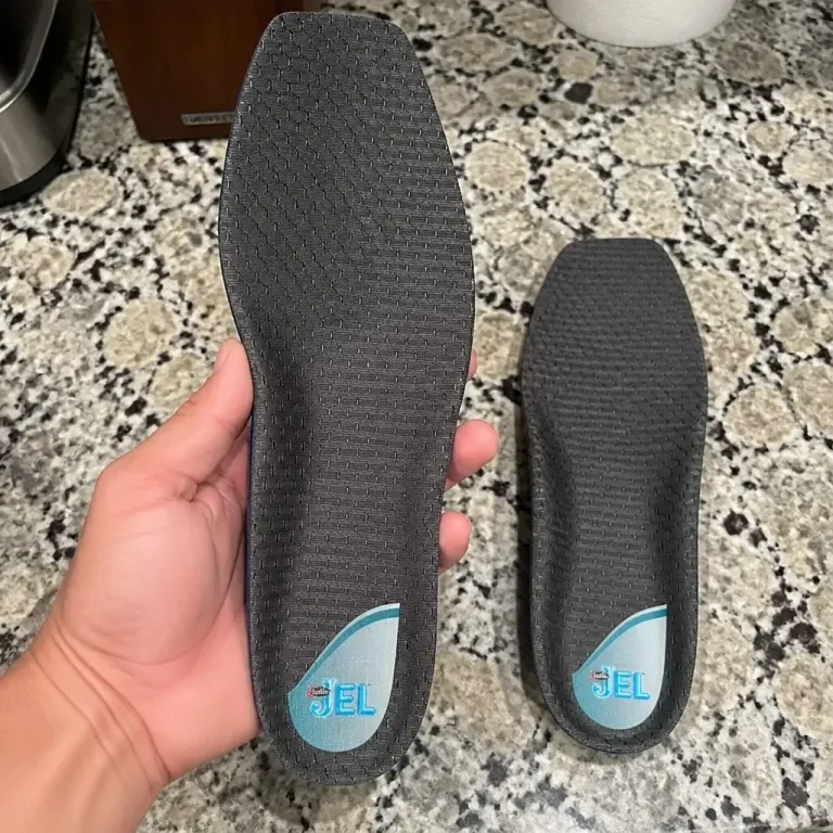 Justin Jel insert held in hand to show the gel and air-cell heel
