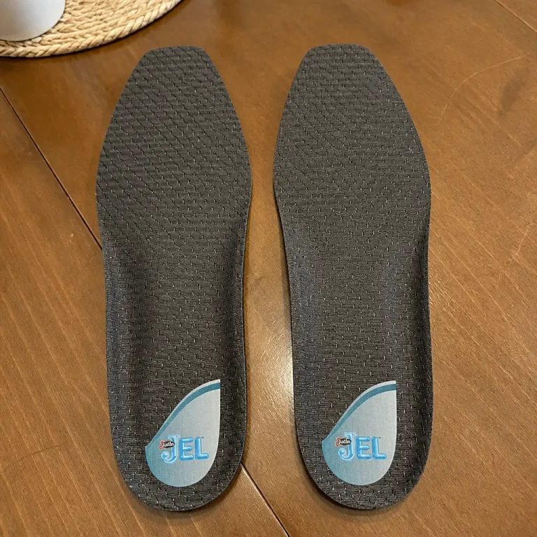 Justin Jel Square Toe Boot Inserts laid out on a kitchen table