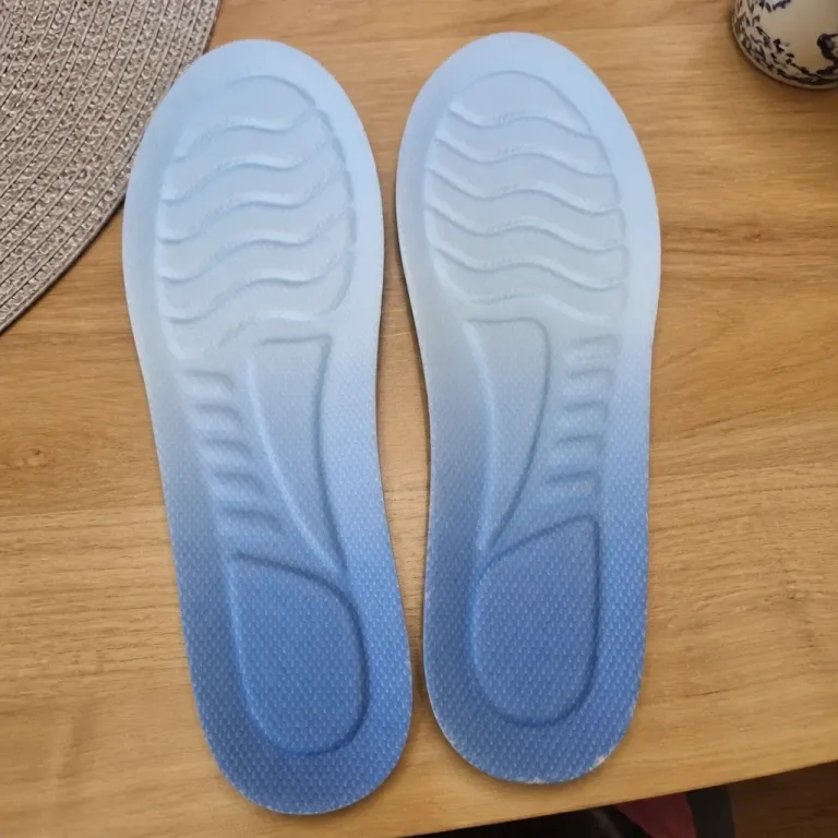 KANEEA insoles laid out on a kitchen table
