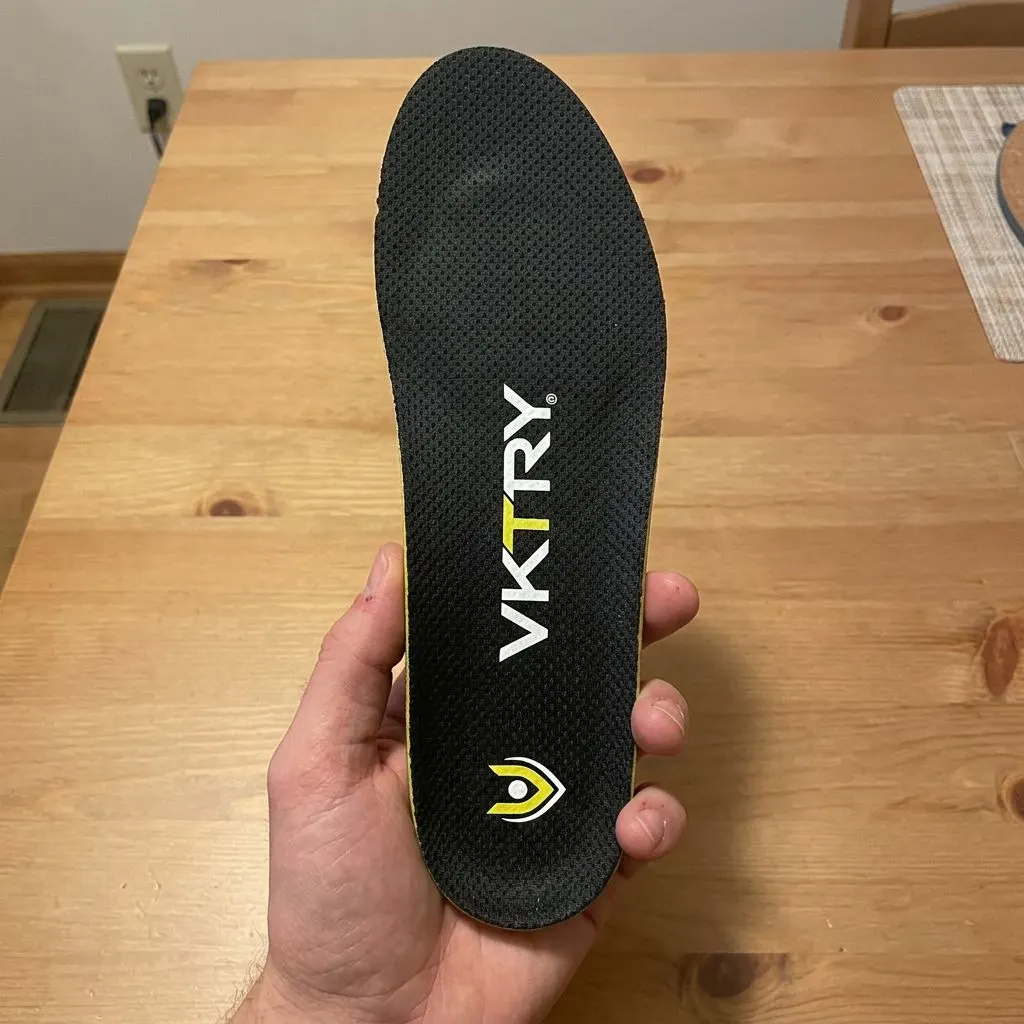 Underside of the VKTRY Gold insole, held in hand