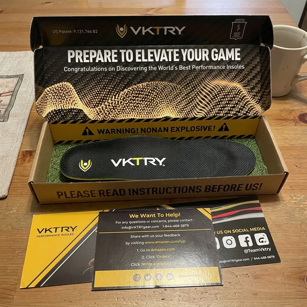 VKTRY Gold insole shown in its retail packaging, with included instruction and support cards
